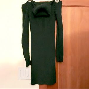 Cozy knit cold shoulder turtleneck sweater.